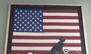 Flag with grand dog